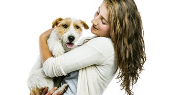 A Milwaukee dog owner holding her dog 