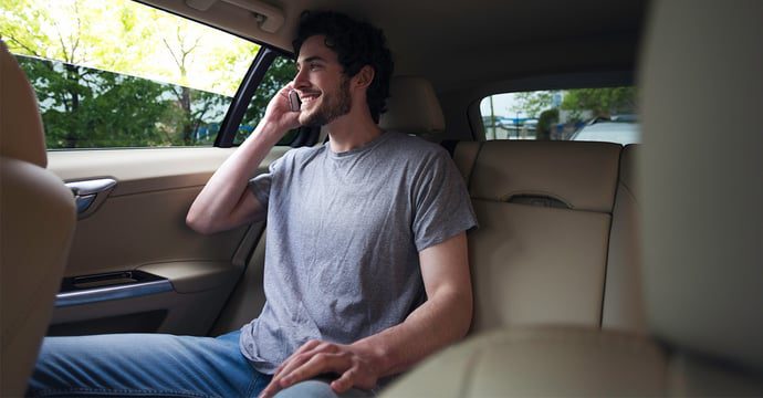 Car passenger on the phone 