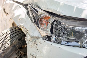 Car with front end damage after an accident