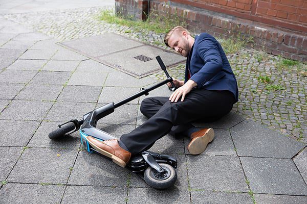 An injured man after a scooter accident in Milwaukee