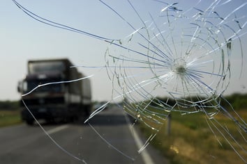 Broken windshield after truck accident