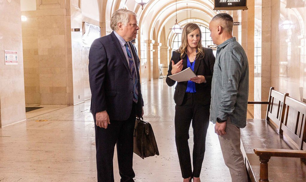Personal Injury Attorneys and Client at the Milwaukee Courthouse
